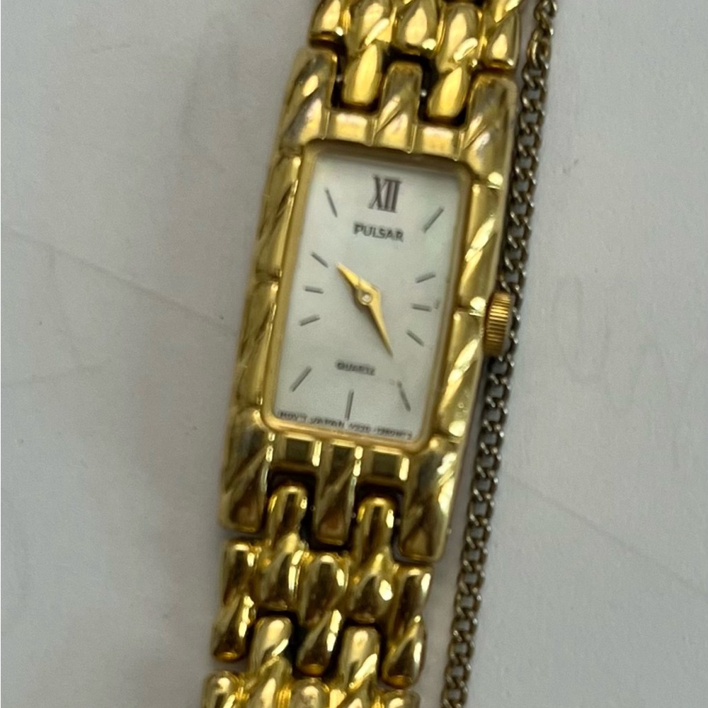 Ladies gold Pulsar watch.
